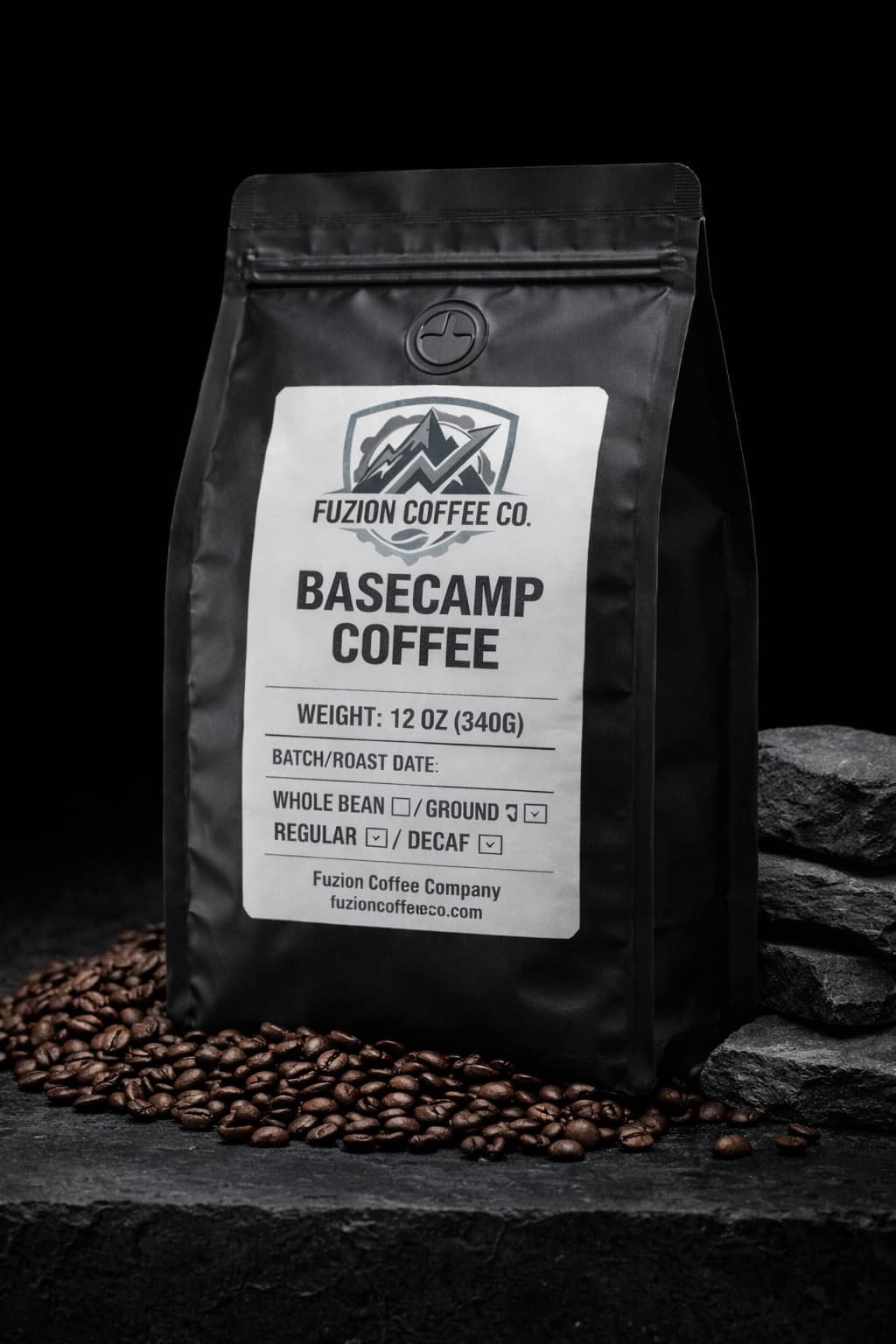 Matte black Basecamp Blend coffee bag by Fuzion Coffee Co on dark marble surface with scattered coffee beans