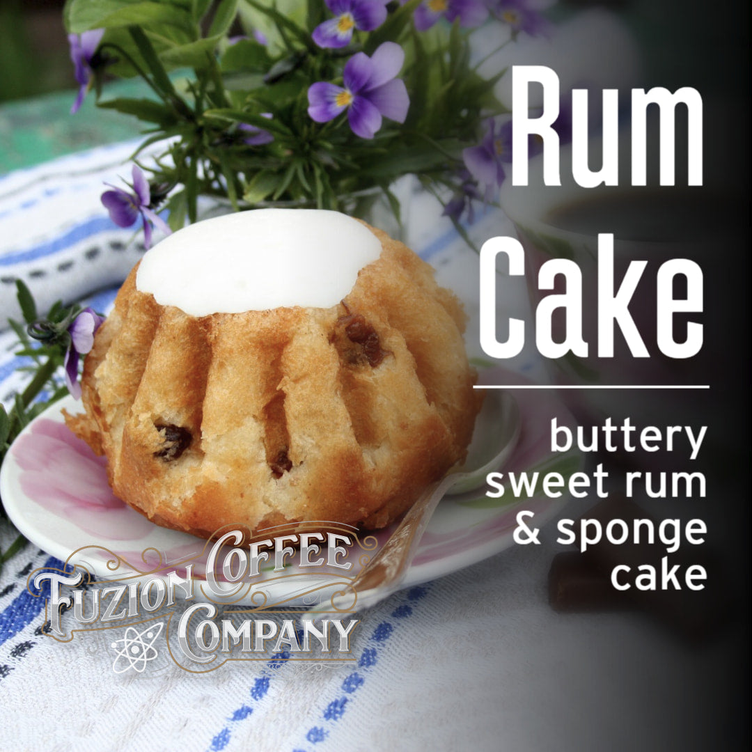 Buttery sweet rum & sponge cake on a plate with Fuzion Coffee Company branding.