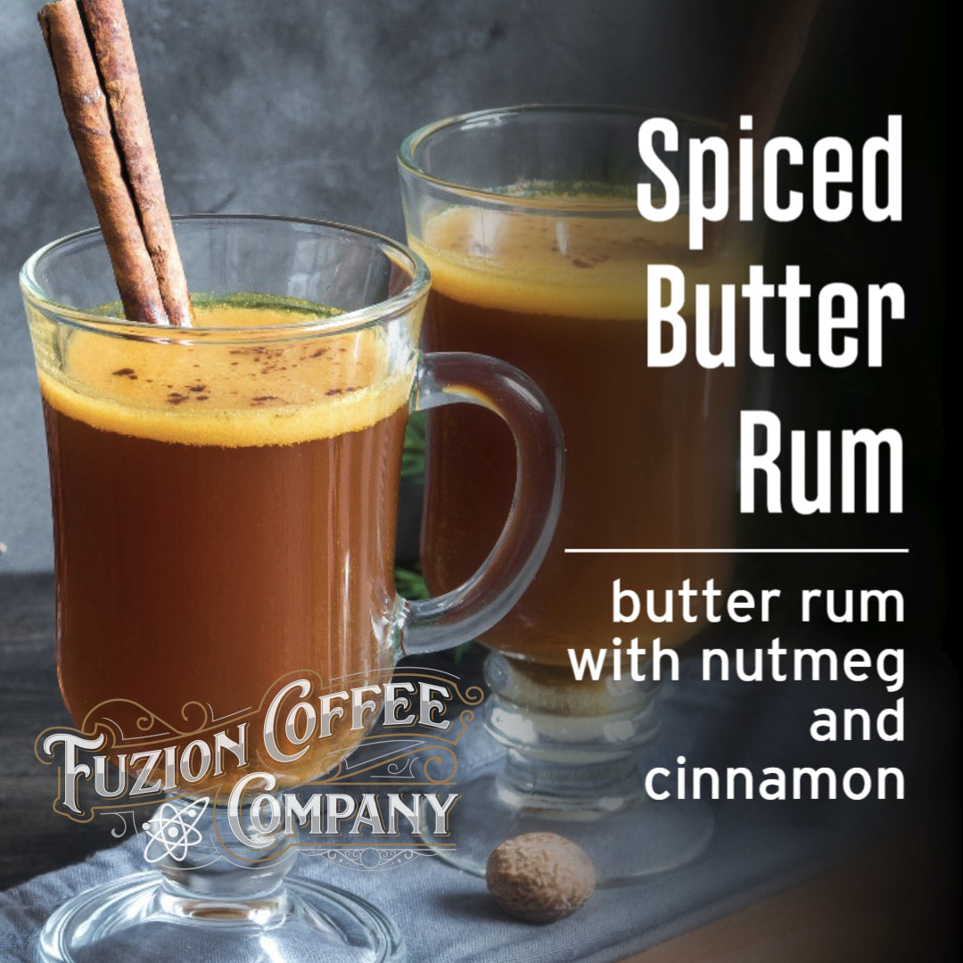 Two glasses of spiced butter rum with nutmeg and cinnamon, featuring Fuzion Coffee Company branding.